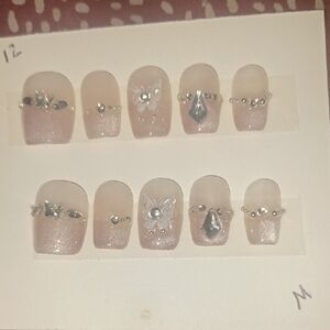 Elegant Pink Press-On Nails with Silver Accents